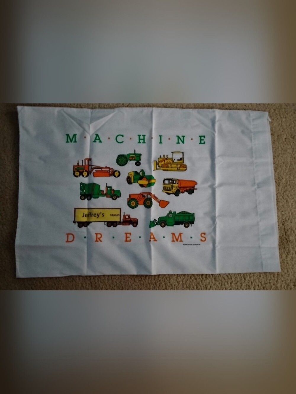 Machine Dreams Kids Pillowcase With Name "Jeffrey's Trucks" Printed On It.